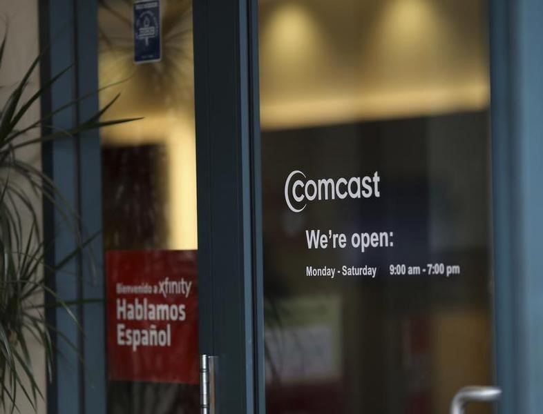 Comcast, Johnson & Johnson announce share buybacks By Reuters