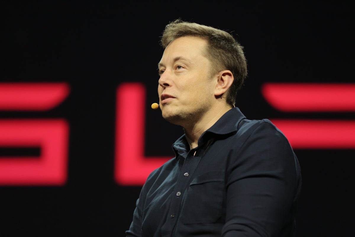 Elon Musk's Brain-Chip Company Delays Halloween 'Show & Tell' By A Month - Tesla (NASDAQ:TSLA)