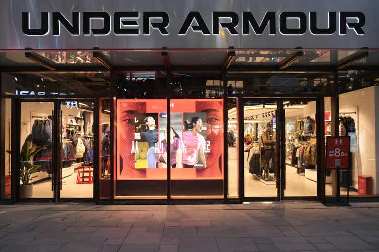 exterior of large Under Armour store in Shanghai at night