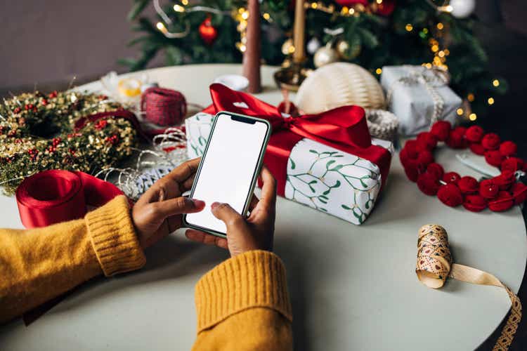Getting Ready for Christmas: an Anonymous Mixed Race Woman Ordering Christmas Presents Online