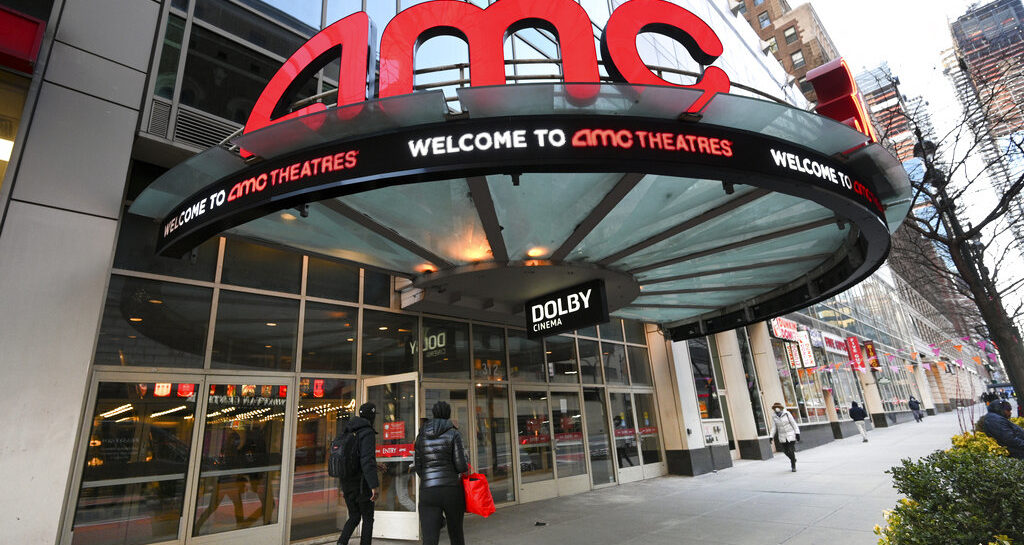 People walk by the AMC 34th Street theater