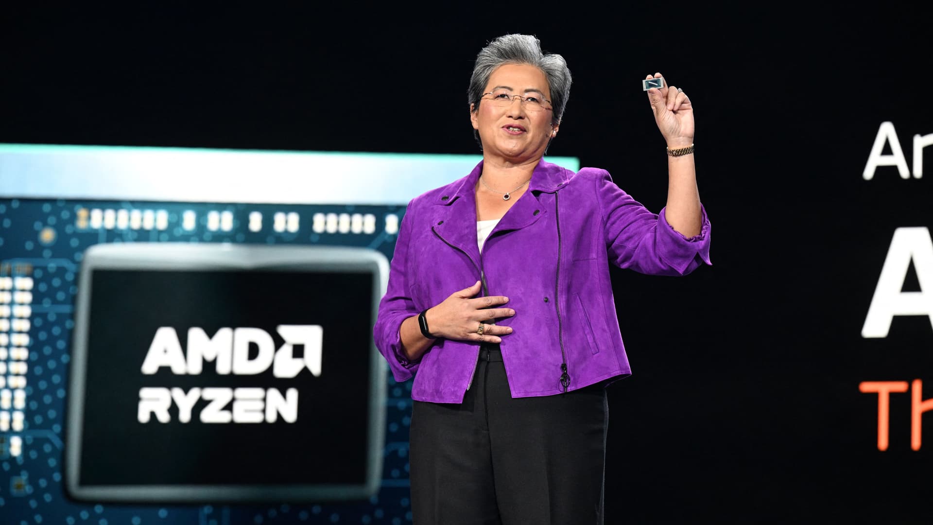Chip stocks rise after AMD earnings, Fed rate hike