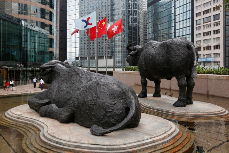 Asian stocks edge lower as markets weigh China stimulus, tech gloom