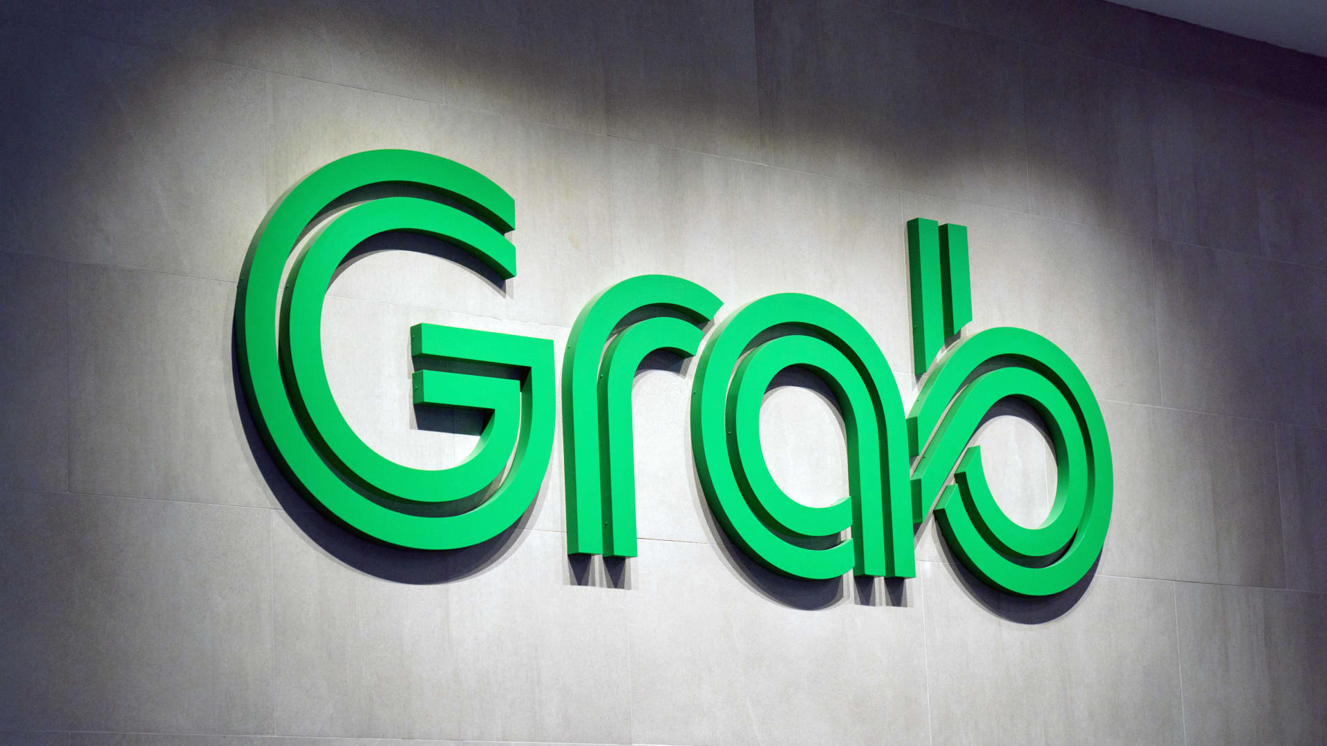 Grab ride-hailing unit on track to hit pre-Covid levels by end 2023