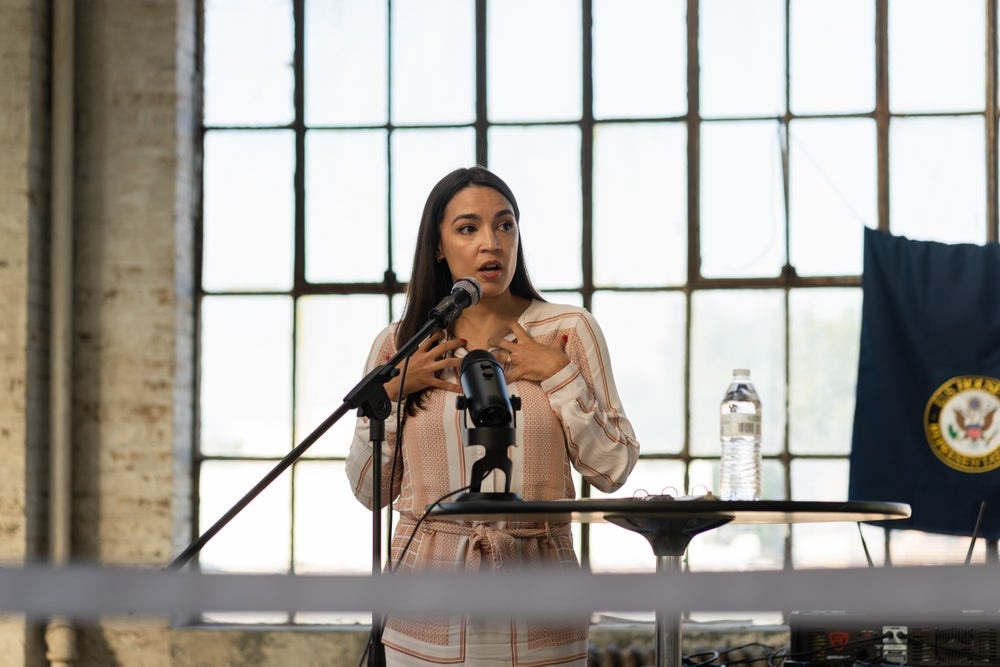 AOC Plans To Trade In Her Tesla Model 3 For A Union-Made EV Amid Disagreement With Elon Musk - Tesla (NASDAQ:TSLA)