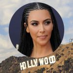 Benzinga Buzz: Kim Kardashian And This QB Great Bid Millions At Jay-Z’s Charity Auction