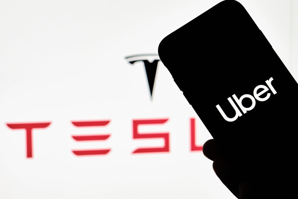 Tesla Teams Up With Uber, Offer Drivers Up To $3K in Savings On Electric Cars - Tesla (NASDAQ:TSLA), Uber Technologies (NYSE:UBER)