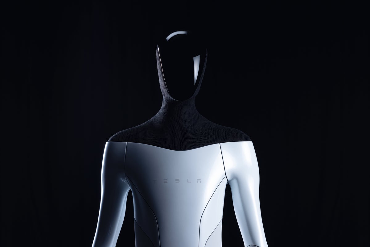 Elon Musk Posts Video Of Tesla's Humanoid Robot Folding Clothes - Tesla (NASDAQ:TSLA)